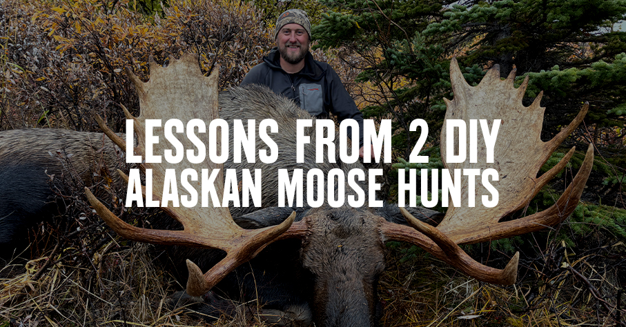 A hunter poses with their harvested bull moose.