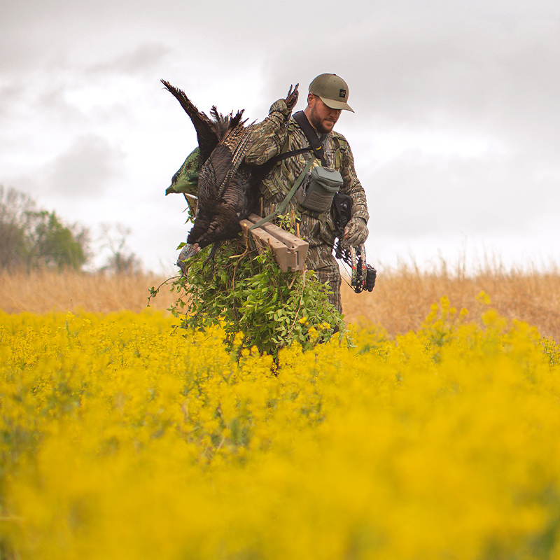 a turkey hunter in a field